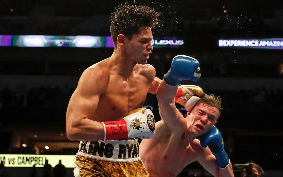 Ryan Garcia (L) lands a left hook agains Luke Campbell during the WBC Interim Lightweight Title fight at American Airlines Center on January 02, 2021 in Dallas, Texas - Getty Images North America /Tim Warner 