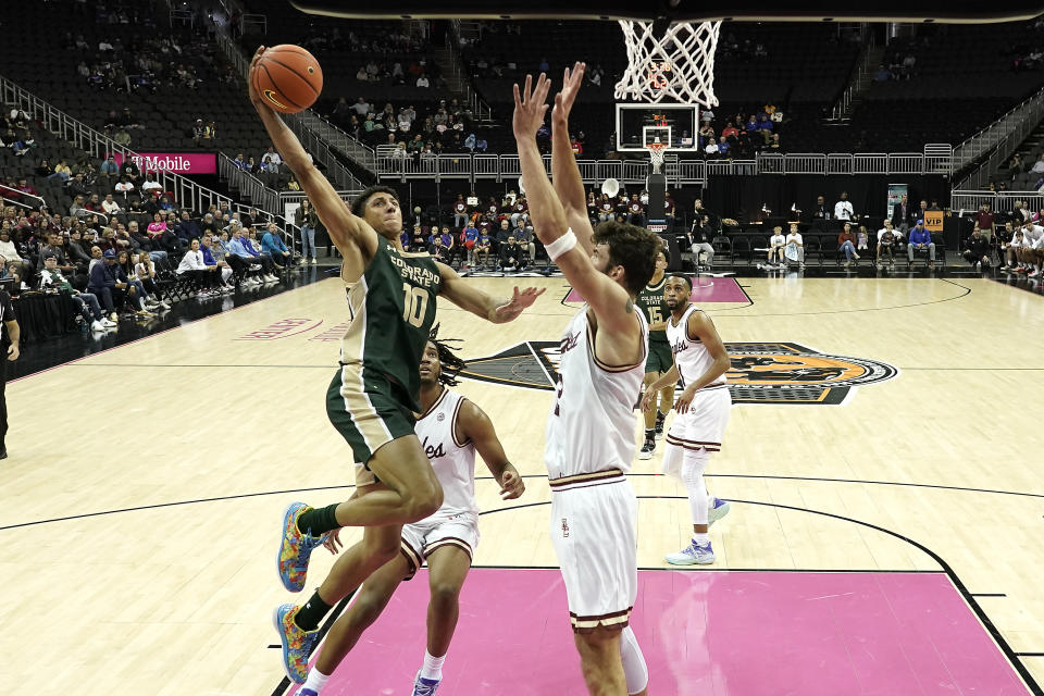 Colorado State guard Nique Clifford (10) shots over Boston College forward Quinten Post (12) during the second half of an NCAA college basketball game Wednesday, Nov. 22, 2023, in Kansas City, Mo. Colorado State won 86-74. (AP Photo/Charlie Riedel)