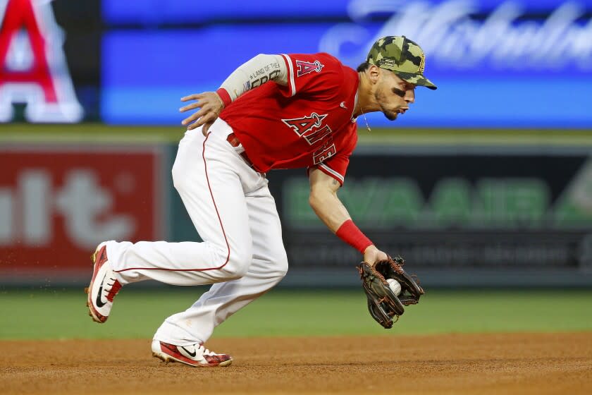 ANAHEIM, CA - MAY 21: Los Angeles Angels shortstop Andrew Velazquez (4) fields a ground ball.
