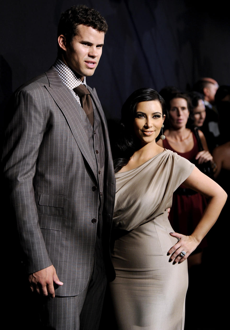 FILE - This Aug. 31, 2011 file photo shows Kim Kardashian and Kris Humphries attending a party thrown in their honor at Capitale in New York. The couple's divorce is unlikely to be concluded before the end of the year, with Humphries' attorneys seeking detailed records from companies that handle the reality starlet's shows and the depositions of her mother-manager Kris Jenner and current boyfriend Kanye West. Kardashian, 31, and Humphries, 26, were wed Aug. 20 in a star-studded, black-tie ceremony at an exclusive estate in California. (AP Photo/Evan Agostini, file)