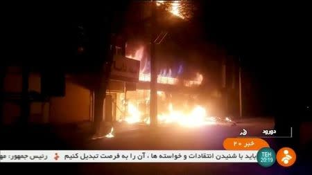 A building on fire is seen in Dorud, Iran, in this still image taken from video on December 31, 2017. IRINN/ReutersTV via REUTERS