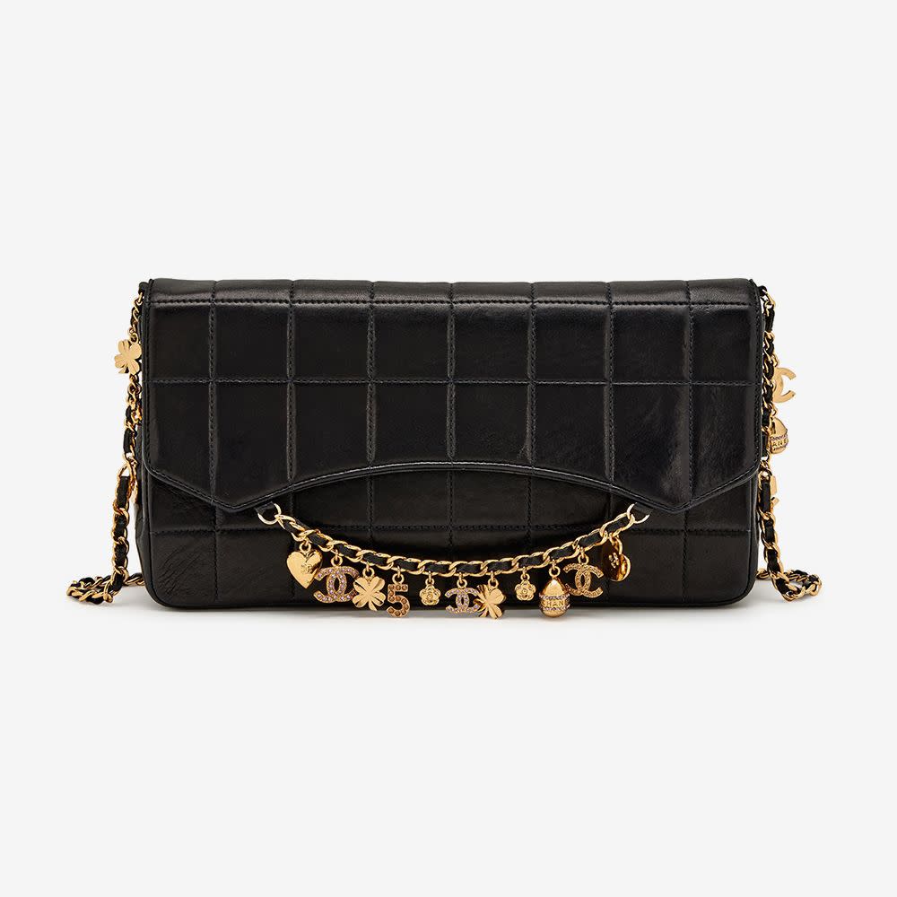 <p><a href="https://www.sothebys.com/en/buy/_chanel-black-quilted-lambskin-chocolate-bar-lucky-charms-chain-flap-bag-gold-hardware-2002-2003" rel="nofollow noopener" target="_blank" data-ylk="slk:Shop Now;elm:context_link;itc:0;sec:content-canvas" class="link rapid-noclick-resp">Shop Now</a></p><p>Lucky Charms Chain Flap Bag</p><p>sothebys.com</p><p>$3900.00</p>