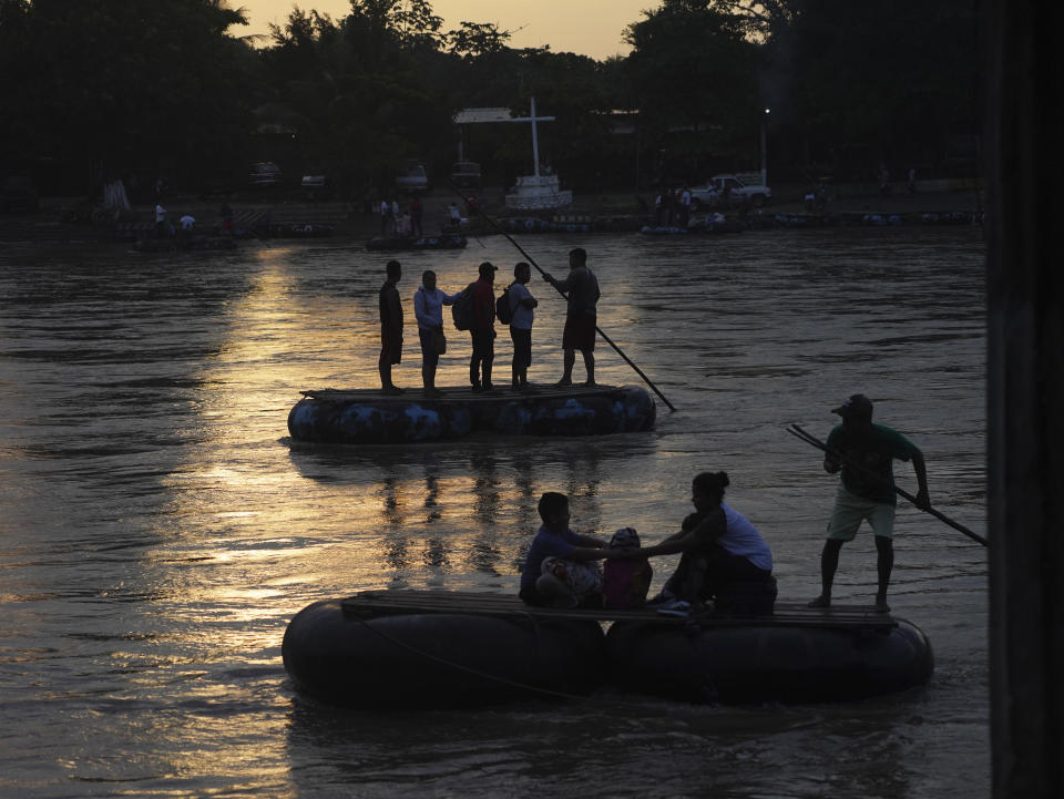 Venezuelan migrants cross the Suchiate River on the border between Guatemala and Mexico, near Ciudad Hidalgo, Chiapas state, Mexico, Tuesday, Oct. 4, 2022. Many migrants are given expulsion orders, but also told they can exchange those documents for transit permits if they made it to a small town about 185 miles (300 kilometers) north, San Pedro Tapanatepec. (AP Photo/Marco Ugarte)