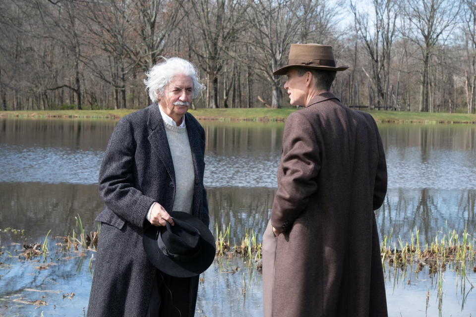 L to R: Tom Conti is Albert Einstein and Cillian Murphy is J. Robert Oppenheimer in OPPENHEIMER, written, produced, and directed by Christopher Nolan.<span class="copyright">Courtesy of Universal Pictures</span>
