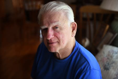 Tony LaGreca, whose son died from an opioid overdose, poses for a portrait at his home in Duxbury