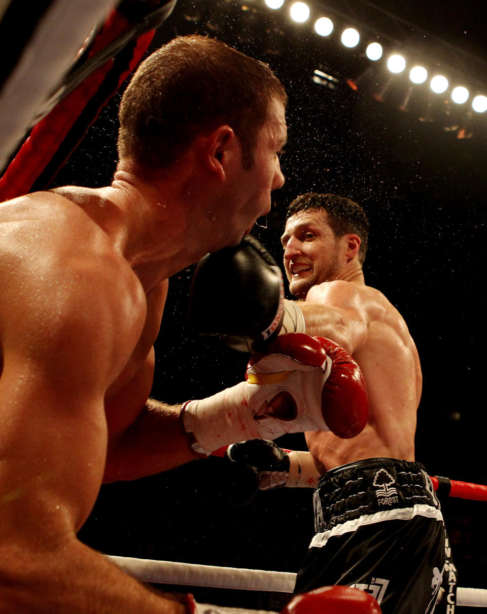 Lucian Bute a finalement perdu sa ceinture après avoir été mis K.O. face à Carl Froch, samedi soir. (Getty Images)