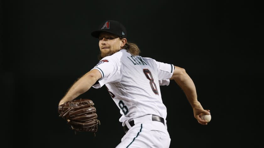 Arizona Diamondbacks starting pitcher Mike Leake warms up prior to a baseball game against the Cincinnati Reds Friday, Sept. 13, 2019, in Phoenix. (AP Photo/Ross D. Franklin)