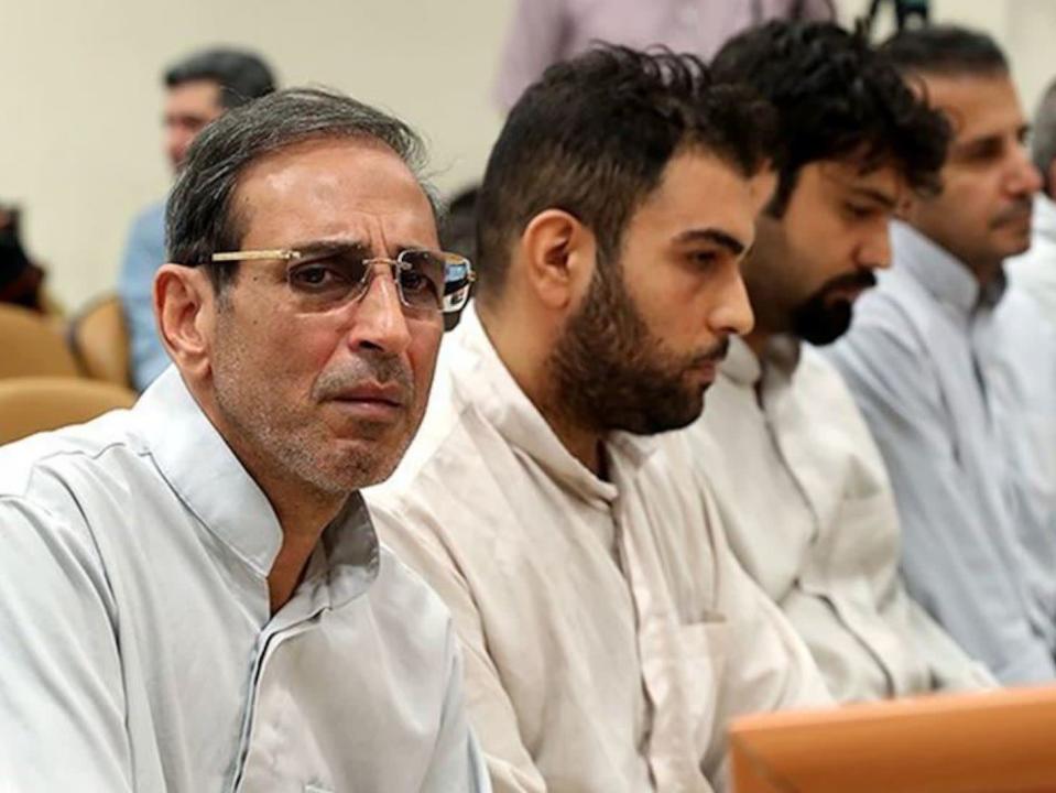 Iranian gold trader Vahid Mazloumin (left) during his trial in September on corruption charges: Reuters