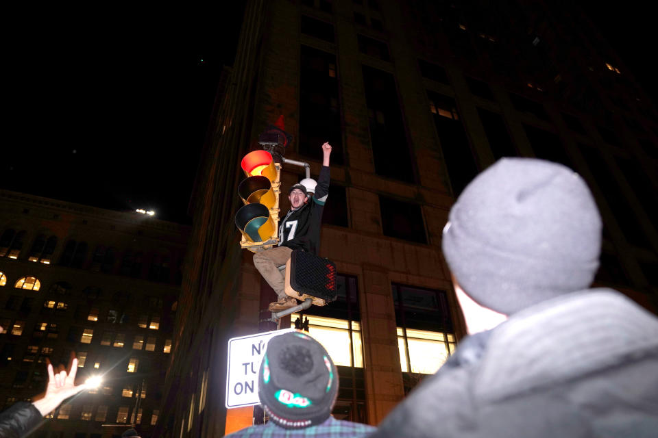 <p>Philadelphia Eagles football fans celebrate their Super Bowl LII victory over the New England Patriots in downtown Philadelphia, Pennsylvania, U.S. February 4, 2018. REUTERS/Jessica Kourkounis </p>