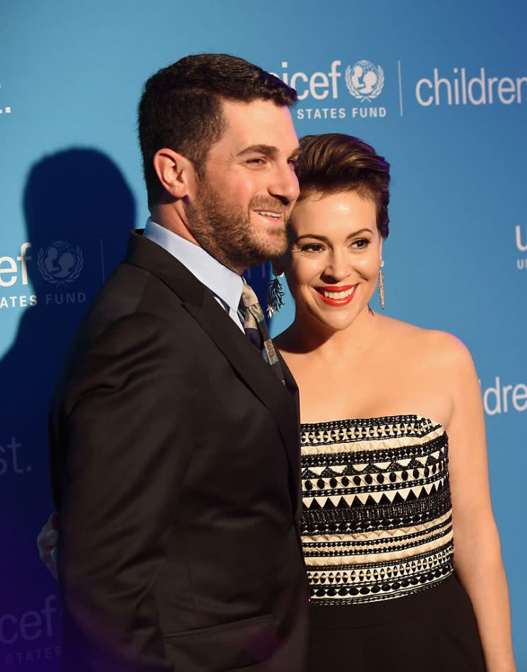 DALLAS, TX - APRIL 15: UNICEF Dave Bugliari (L) and Ambassador and recipient of the 'Spirit of Compassion' award Alyssa Milano at the Children First. An Evening With UNICEF on April 15, 2016 in Dallas, Texas. (Photo by Cooper Neill/Getty Images for U.S. Fund for UNICEF)