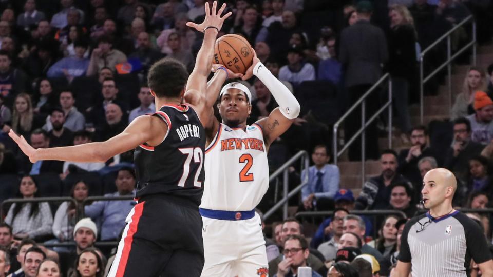 Jan 9, 2024; New York, New York, USA; New York Knicks guard Miles McBride (2) takes a three point shot past Portland Trail Blazers guard Rayan Rupert (72) in the fourth quarter at Madison Square Garden. Mandatory Credit: Wendell Cruz-USA TODAY Sports
