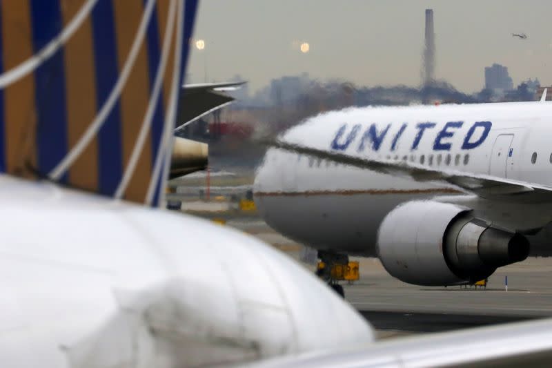 FILE PHOTO: FILE PHOTO: A United Airlines passenger jet taxis at Newark Liberty International Airport