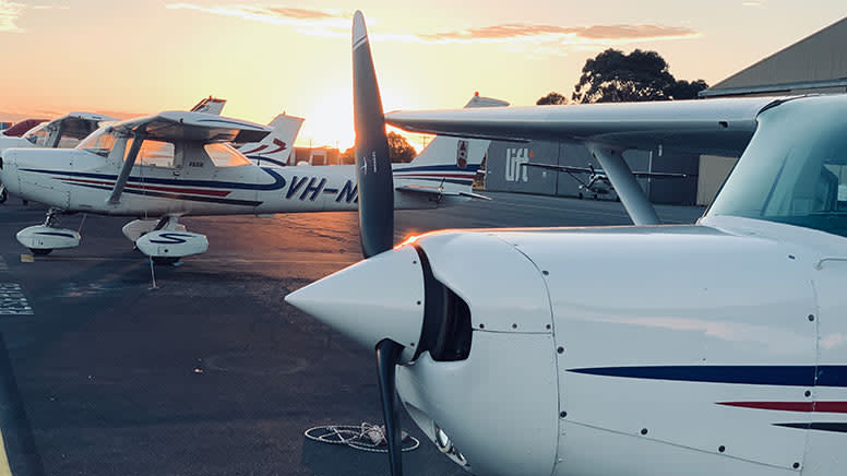 pic of light planes on tarmac