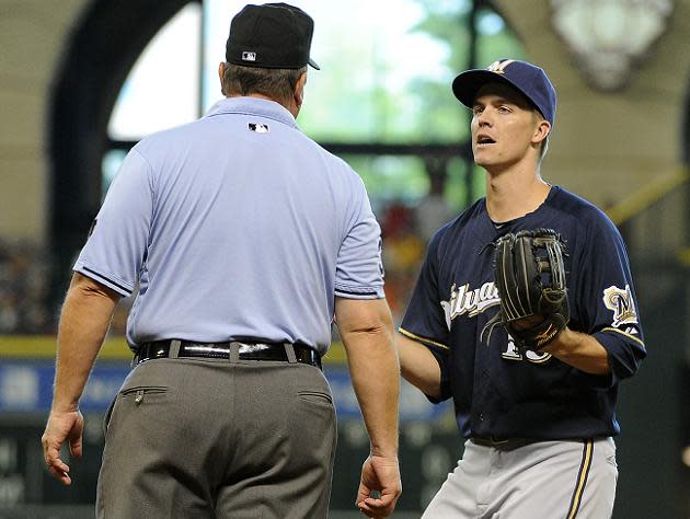 Bring on the robots: Zack Greinke ejected after four pitches for spiking  baseball