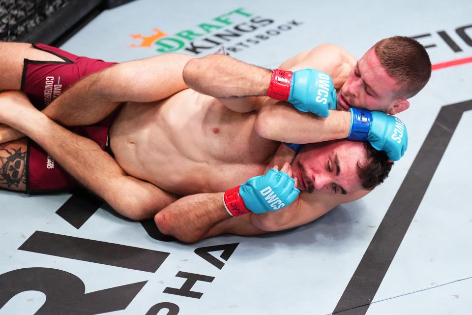 LAS VEGAS, NEVADA - AUGUST 20: (R-L) Cody Haddon of Australia secures a rear choke submission against Billy Brand in a bantamweight fight during Dana White's Contender Series, season eight week two on August 20, 2024 in Las Vegas, Nevada. (Photo by Chris Unger/Zuffa LLC)