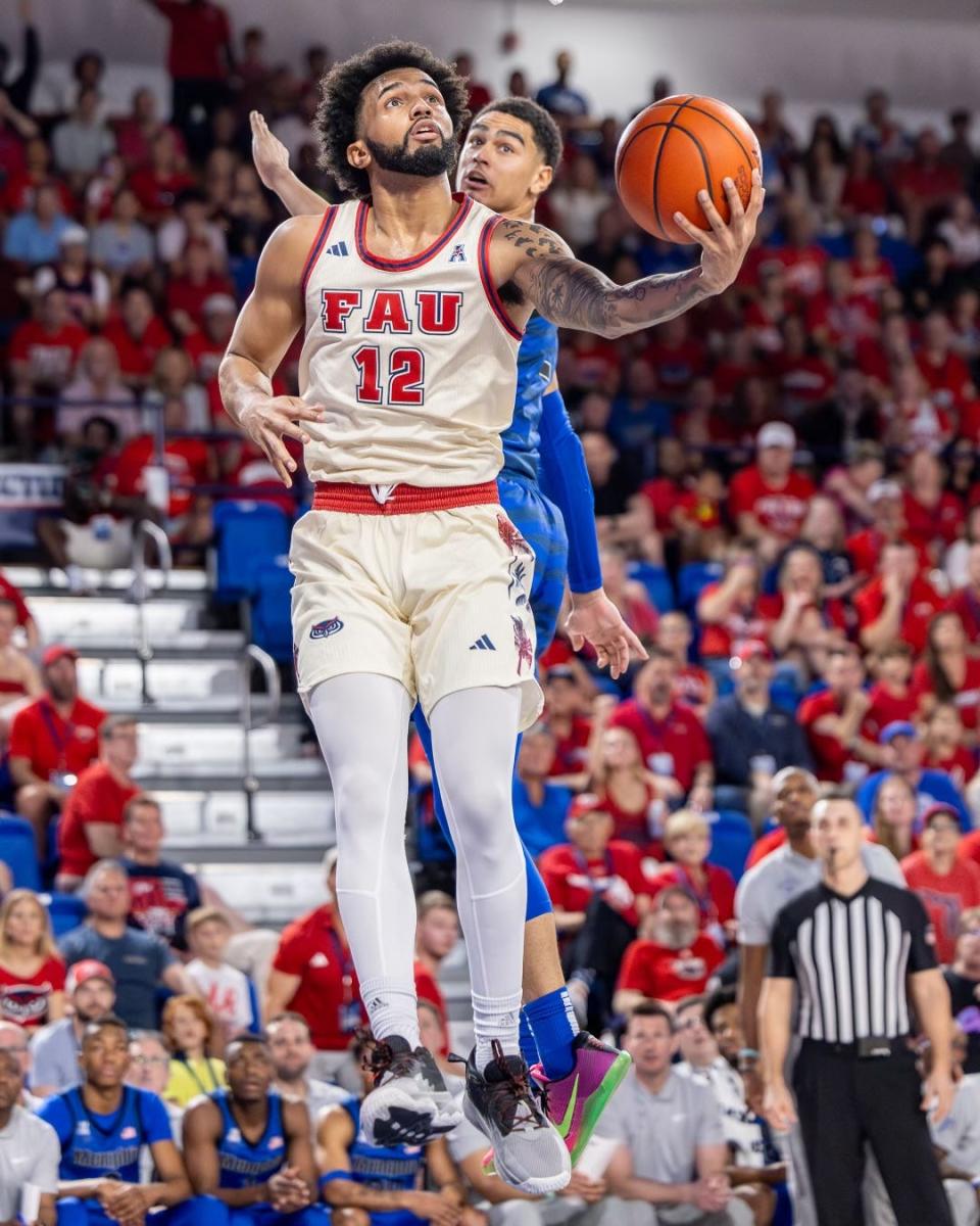 Jalen Gaffney beats a Memphis defender to the basket Saturday in FAU's win over the Tigers in Boca Raton.