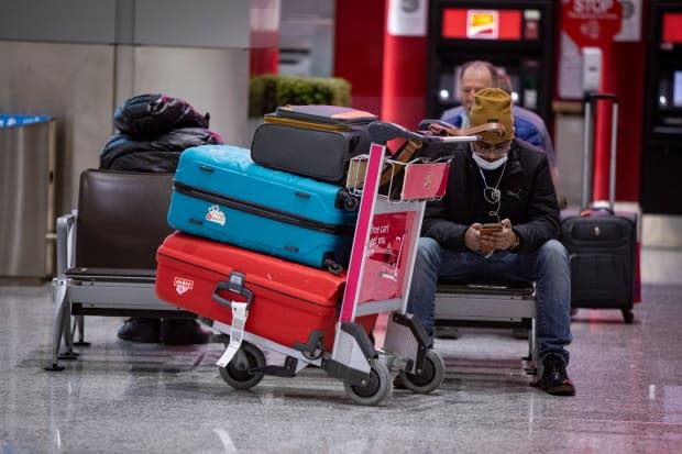 Travellers arriving at Toronto Pearson airport will be split into two queues depending on their vaccination status. (Evan Mitsui/CBC - image credit)