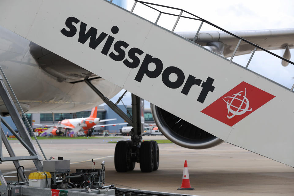 Swissport moving staircase at Luton Airport. (Photo by Jonathan Brady/PA Images via Getty Images)