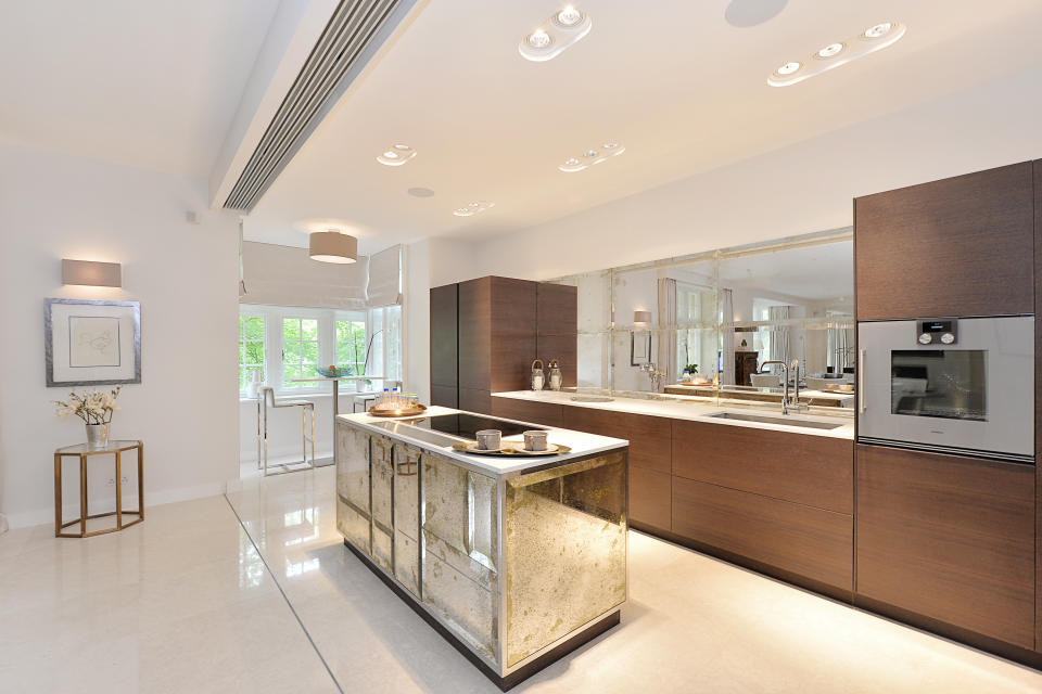 <p>The open plan sleek and modern kitchen in the staff apartment. </p>