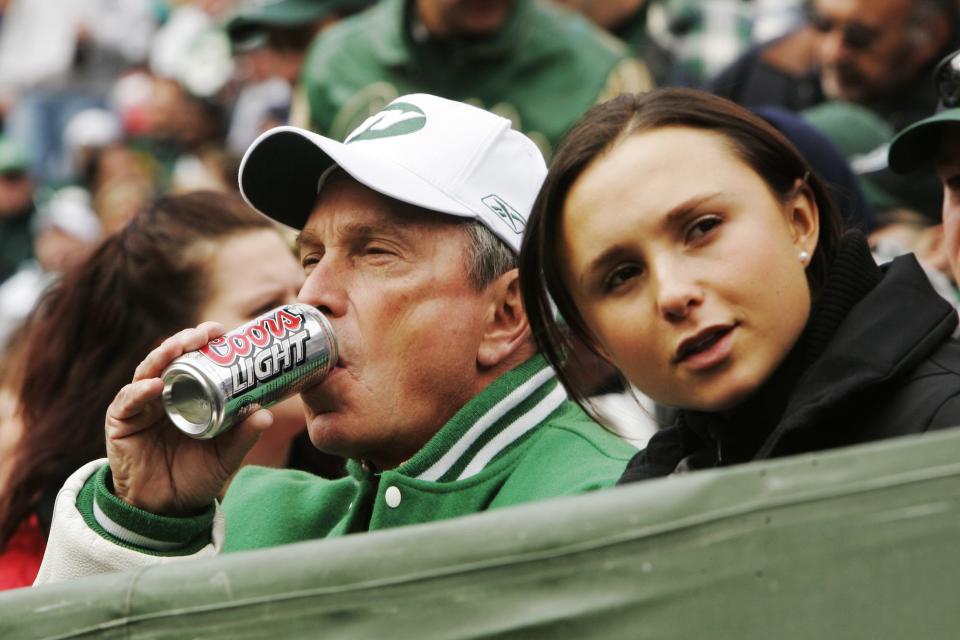 Mayor Michael Bloomberg enjoys a beer with his daughter Georgina during the New York Jets versus San Francisco 49ers football game at the Meadowlands. (