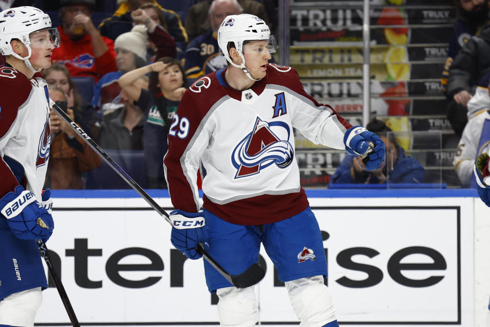 Colorado Avalanche center Nathan MacKinnon (29) celebrates his goal against the Buffalo Sabres during the second period of an NHL hockey game Thursday, Dec. 1, 2022, in Buffalo, N.Y. (AP Photo/Jeffrey T. Barnes)