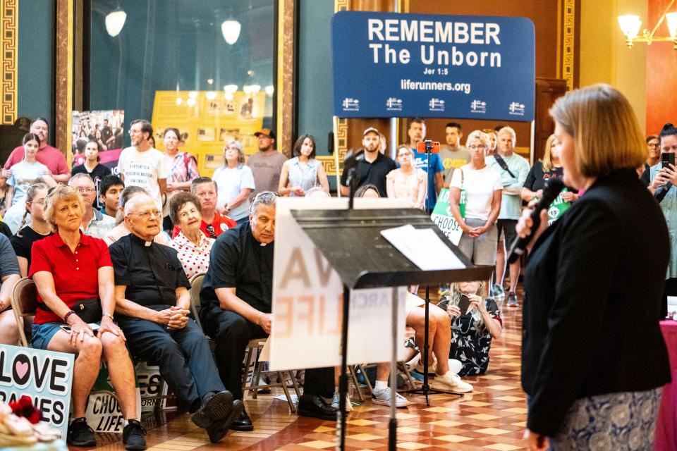 People listen as Iowa Attorney General Brenna Bird speaks during Iowa March For Life at the Iowa State Capitol on Saturday, June 22, 2024, in Des Moines.