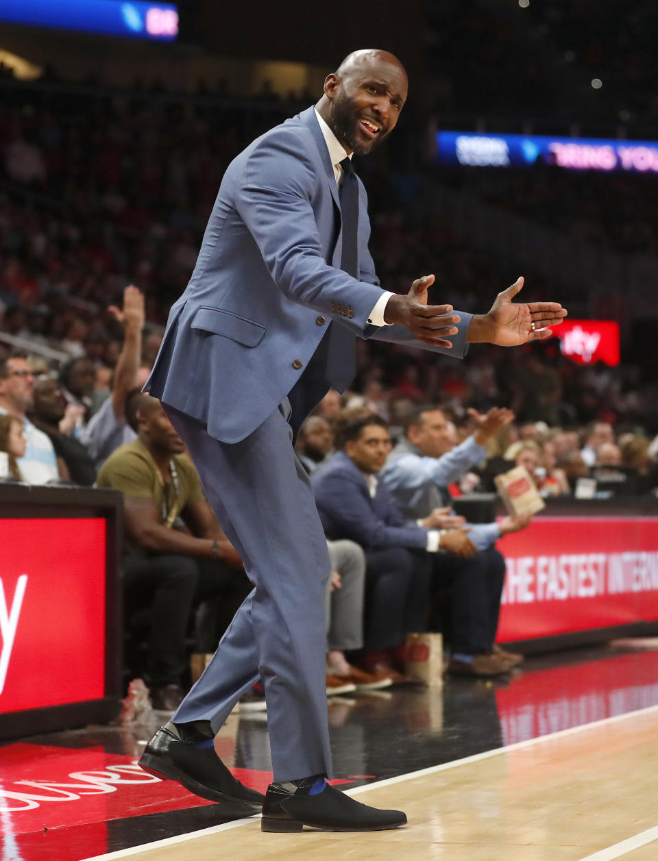 Atlanta Hawks head coach Lloyd Pierce reacts in the first half of an NBA basketball game against the Indiana Pacers Wednesday, April 10, 2019, in Atlanta. (AP Photo/John Bazemore)