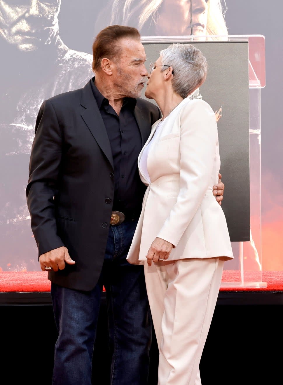 Arnold Schwarzenegger and Jamie Lee Curtis attend the Jamie Lee Curtis Hand and Footprint In Cement Ceremony at TCL Chinese Theatre on October 12, 2022 in Hollywood, California.