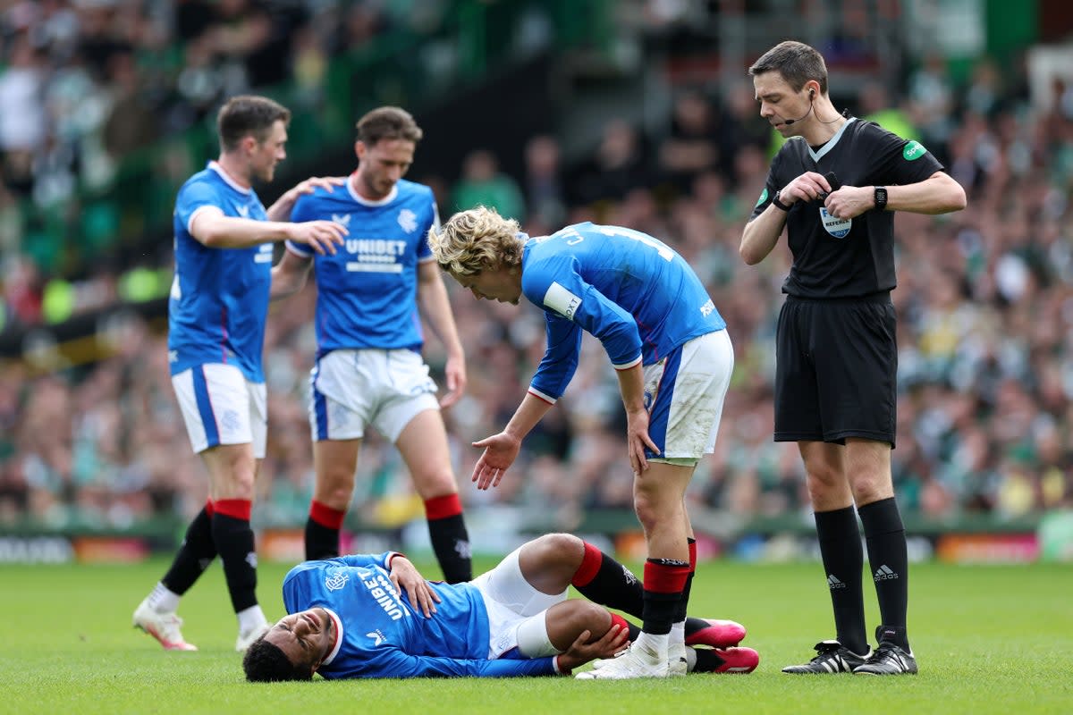 Referee Kevin Clancy (right) has been targeted with abuse after refereeing Celtic’s game against Rangers  (Getty Images)