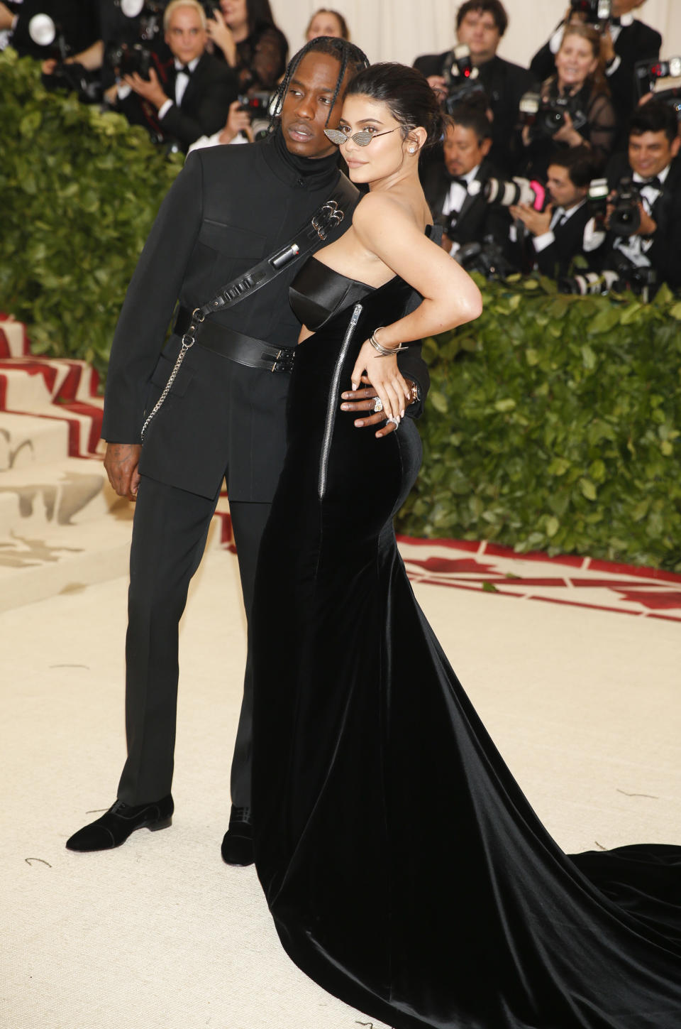 Travis Scott and Kylie Jenner arrive at the Metropolitan Museum of Art Costume Institute Gala (Met Gala) to celebrate the opening of “Heavenly Bodies: Fashion and the Catholic Imagination” in the Manhattan borough of New York, U.S., May 7, 2018. REUTERS/Carlo Allegri