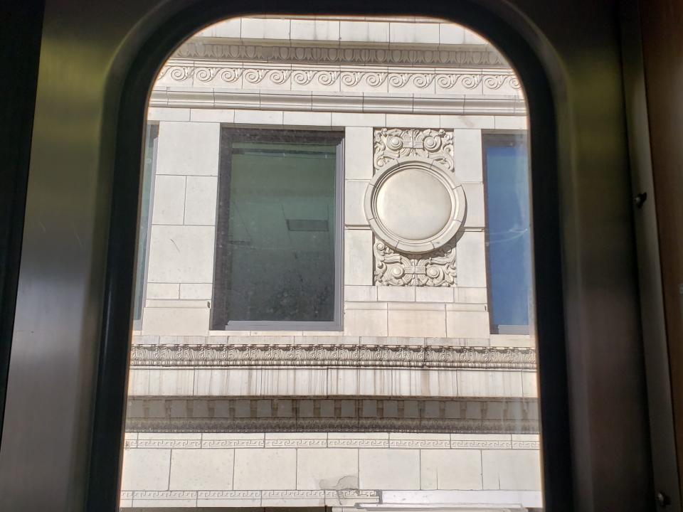 shot of a cool architectural feature on a building in downtown Chicago from the orange line