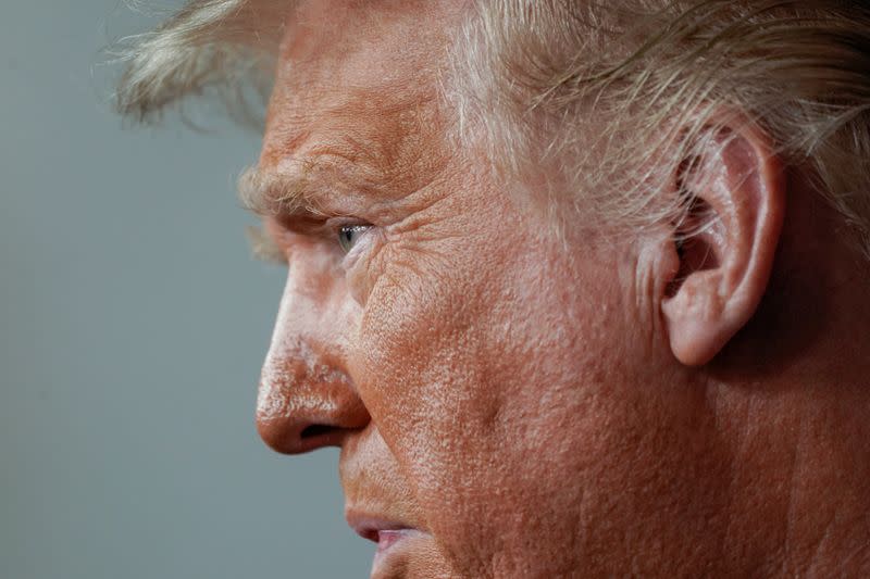 U.S. President Trump speaks to reporters during a news conference