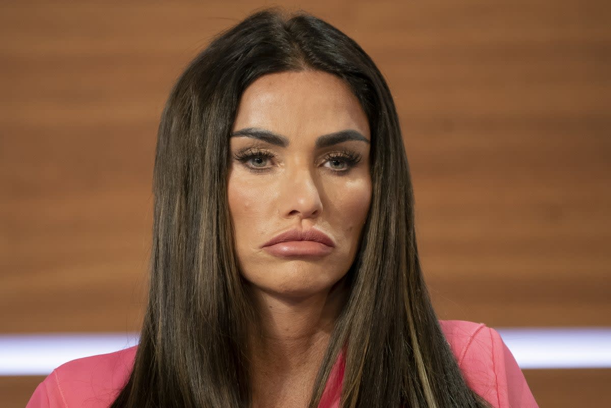 Katie Price said she wants to educate young women about how “damaging” plastic surgery can be to the body (PA)