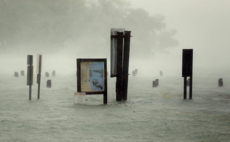 <p><strong>North Miami Beach</strong><br>Flood waters rise around signs at the Haulover Marine Center at Haulover Park as Hurricane Irma passes by, Sunday, Sept. 10, 2017, in North Miami Beach, Fla. (AP Photo/Wilfredo Lee) </p>