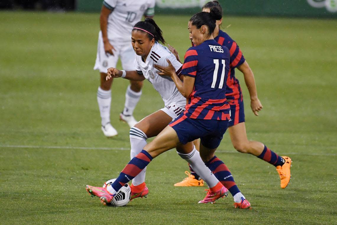 American Falls High grad Maria Sanchez, left, will play for host Mexico at the Concacaf W Championship. Above, she fights through pressure from the United States’ during a 2021 friendly.