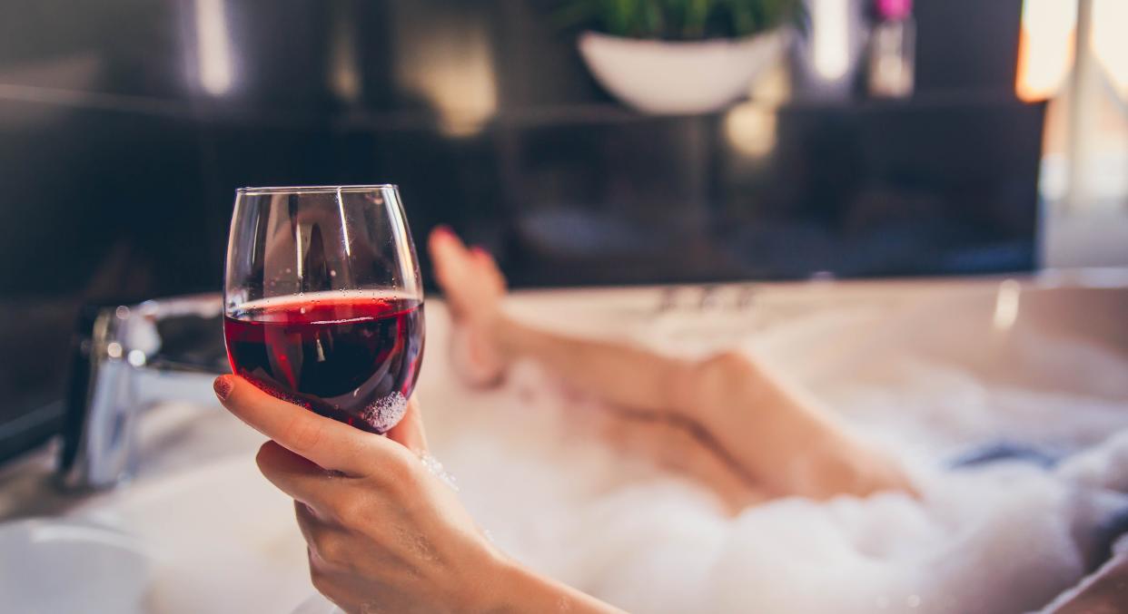 Amazon are selling an affordable wine glass holder for your bathroom [Image: Getty]