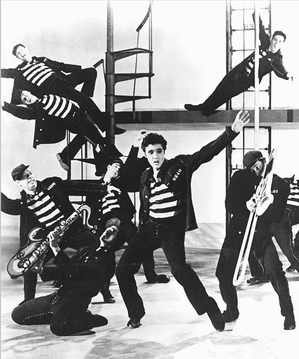 How huge a debt does Elvis Presley (seen in 1957's "Jailhouse Rock") owe to Black music?