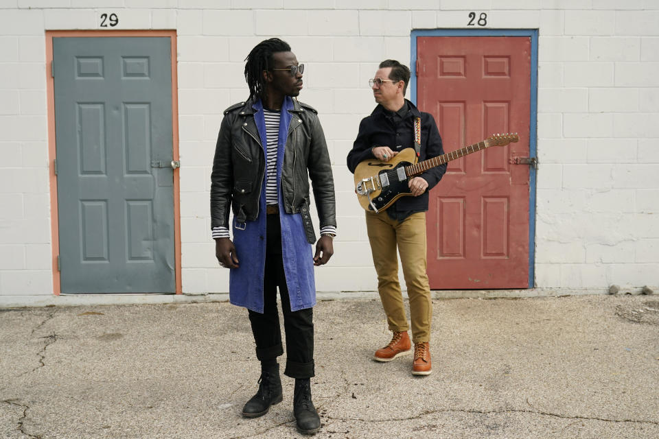 Adrian Quesada, left, and Eric Burton, of Black Pumas, pose for a portrait in Austin, Texas on Feb. 5, 2021. Their deluxe debut album is nominated for album of the year at the 2021 Grammy Awards and their single “Colors” is nominated for record of the year and best American roots performance. (AP Photo/Eric Gay)