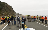 FILE - In this Friday, April 23, 2021, file photo, California Gov. Gavin Newsom speaks during a news conference at the newly reopened California's Highway 1 (SR-1) at Rat Creek near Big Sur, Calif. Heavy rainstorms in Jan. 2021, caused a landslide, which closed the scenic highway. A fading coronavirus crisis and an astounding windfall of tax dollars have reshuffled California's emerging recall election, allowing Democratic Gov. Newsom to talk of a mask-free future and propose billions in new spending for schools and businesses as he looks to fend off Republicans who depict him as a foppish failure. (AP Photo/Nic Coury, File)