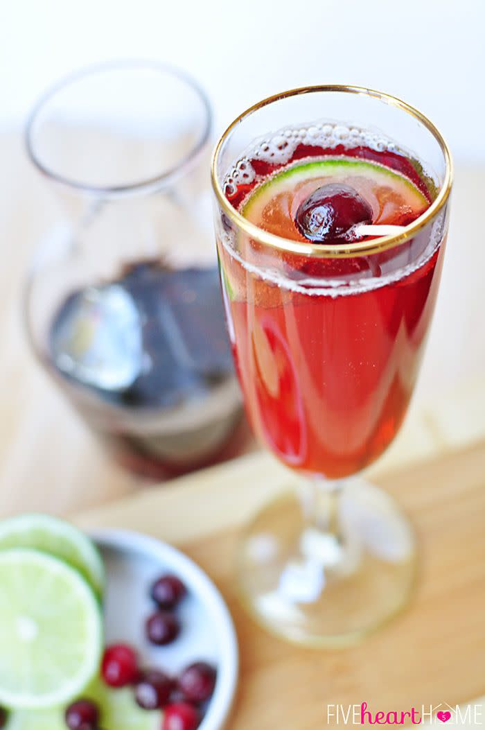 <p>To whip up a glass of these dreamy drinks, start with a base of cranberry and pomegranate juice, then top with seltzer water and a squeeze of fresh lime juice. </p><p>Get the<strong> <a href="http://www.fivehearthome.com/2013/12/22/cranberry-pomegranate-bellinis-with-lime/" rel="nofollow noopener" target="_blank" data-ylk="slk:Cranberry Pomegranate &quot;Bellinis&quot; With Lime recipe" class="link ">Cranberry Pomegranate "Bellinis" With Lime recipe</a> </strong>at Five Heart Home. </p>