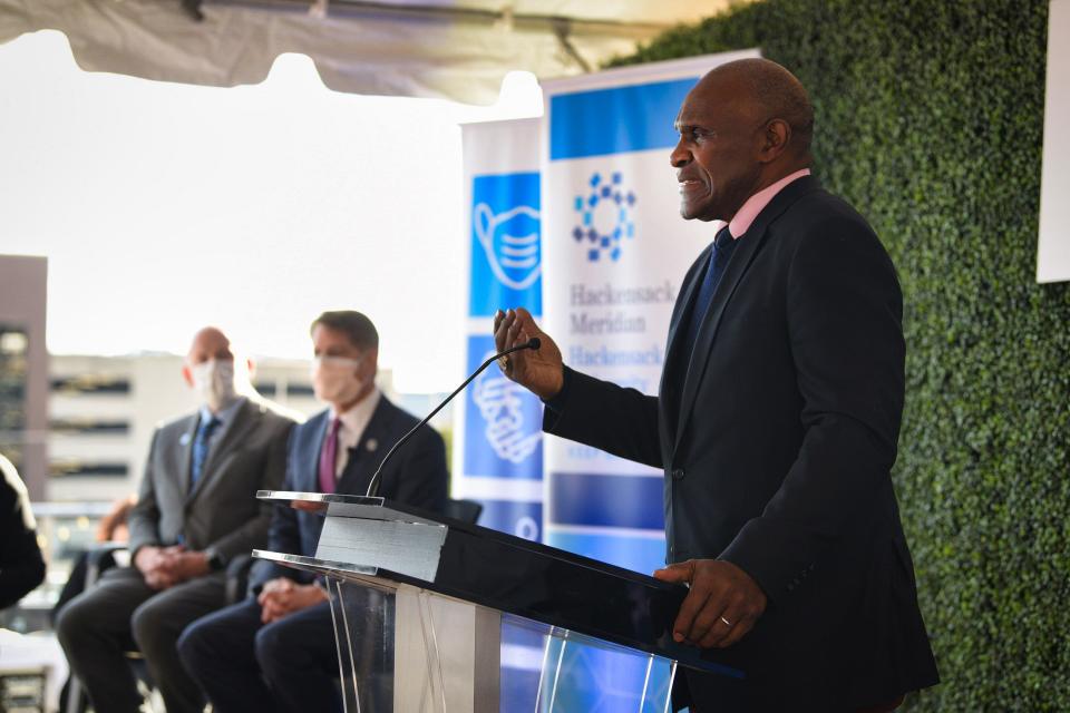 Harry Carson, former New York Giant, talks about the beginning of the phase 1A vaccination effort and the first team members to receive the vaccine during a press conference at John Theurer Cancer Center, part of Hackensack University Medical Center in Hackensack.