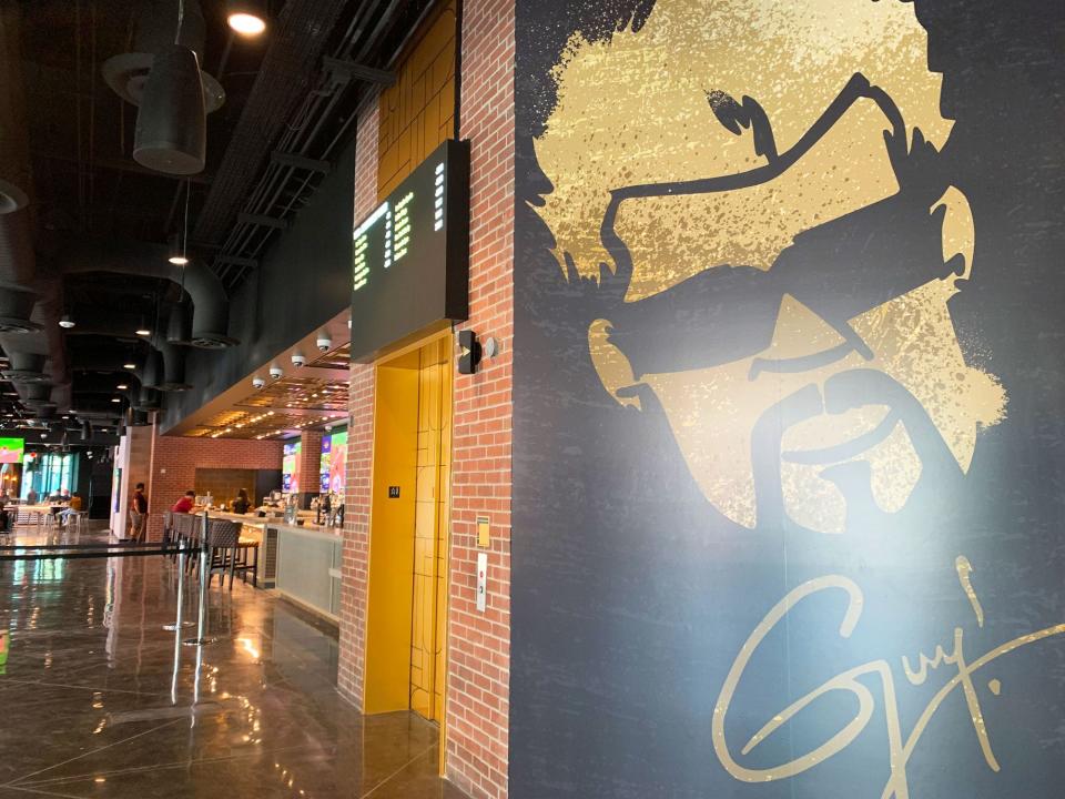 The mayor of Flavortown looks over the restaurant space at Caesars Sportsbook, a standalone building next to Chase Field.