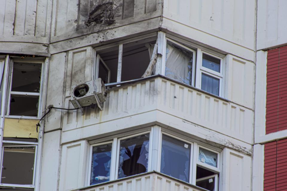 This photo shows a part of an apartment building which was reportedly damaged by Ukrainian drone in Moscow, Russia, Tuesday, May 30, 2023. In Moscow, residents reported hearing explosions and Mayor Sergei Sobyanin later confirmed there had been a drone attack that he said caused "insignificant" damage. (AP Photo)