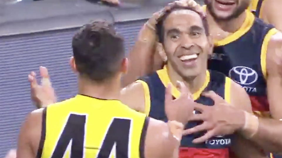 Adelaide's Eddie Betts, pictured after kicking a miraculous goal, shakes hands with Sydney Stack in the final quarter.