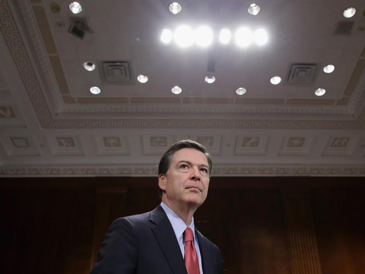 <p>James Comey, the former FBI director who was fired by Donald Trump, says the president should not be charged with any alleged crimes</p>
