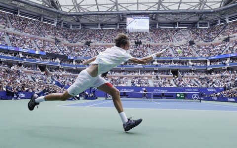 Daniil Medvedev of Russia hits a return to Rafael Nadal of Spain during the men's final match on the fourteenth day of the US Open Tennis Championship - Credit: REX