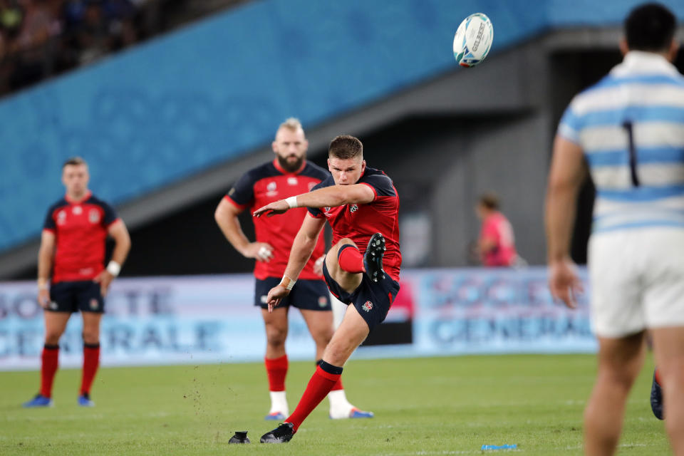 England's Owen Farrell kicks a conversion during the Rugby World Cup Pool C game at Tokyo Stadium between England and Argentina in Tokyo, Japan, Saturday, Oct. 5, 2019. (AP Photo/Christophe Ena)