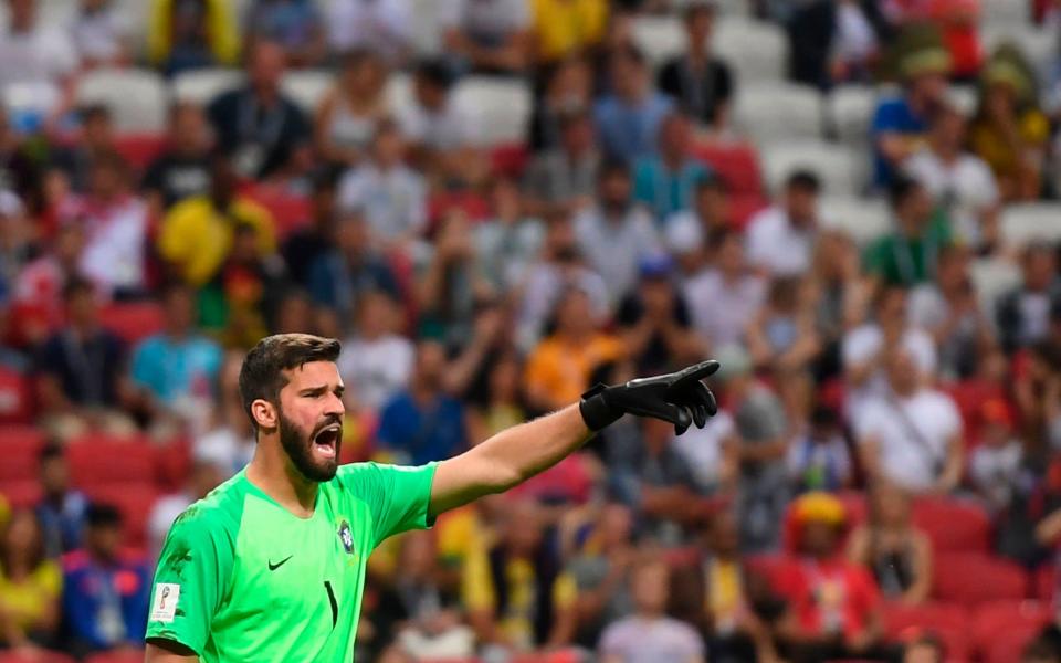 Liverpool have agreed a fee for Alisson but are now waiting to see whether the keeper will join - AFP