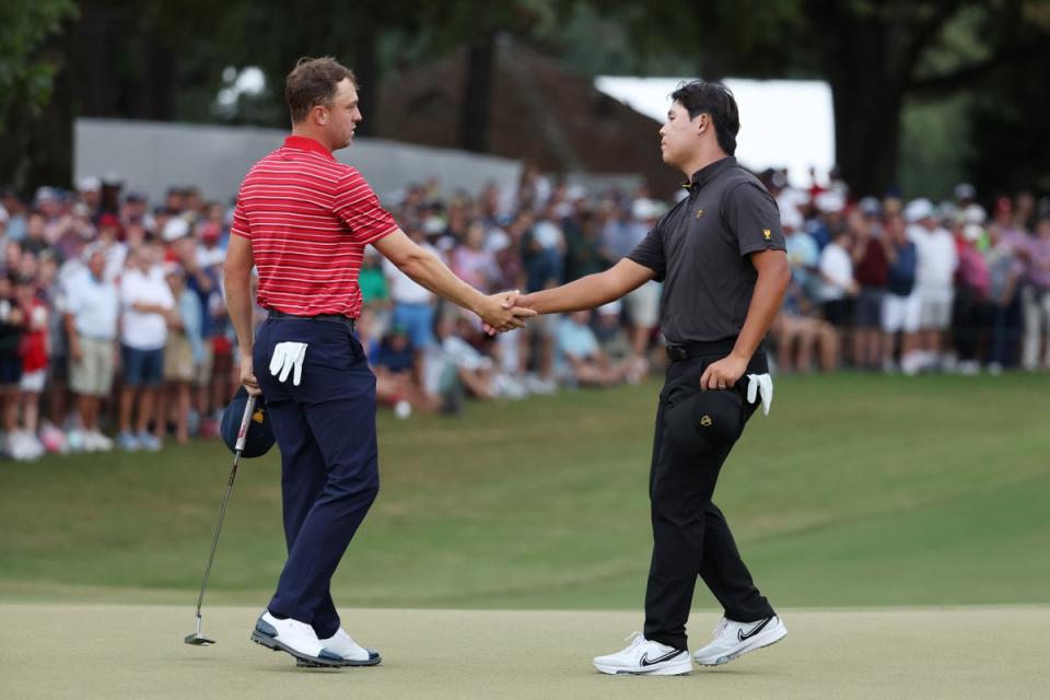 Si-woo Kim (right) beat Justin Thomas 1 up on the final day of the Presidents Cup  (Getty Images)