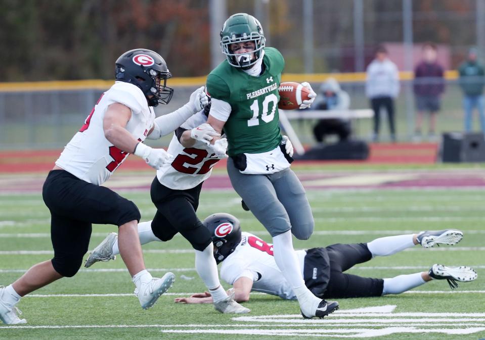 PleasantvilleÕs Daniel Picart (10) looks for some running room in the Rye defense during the Section 1 Class B championship at Arlington High School in Freedom Plains Nov. 11, 2023. Rye won the game 35-21.